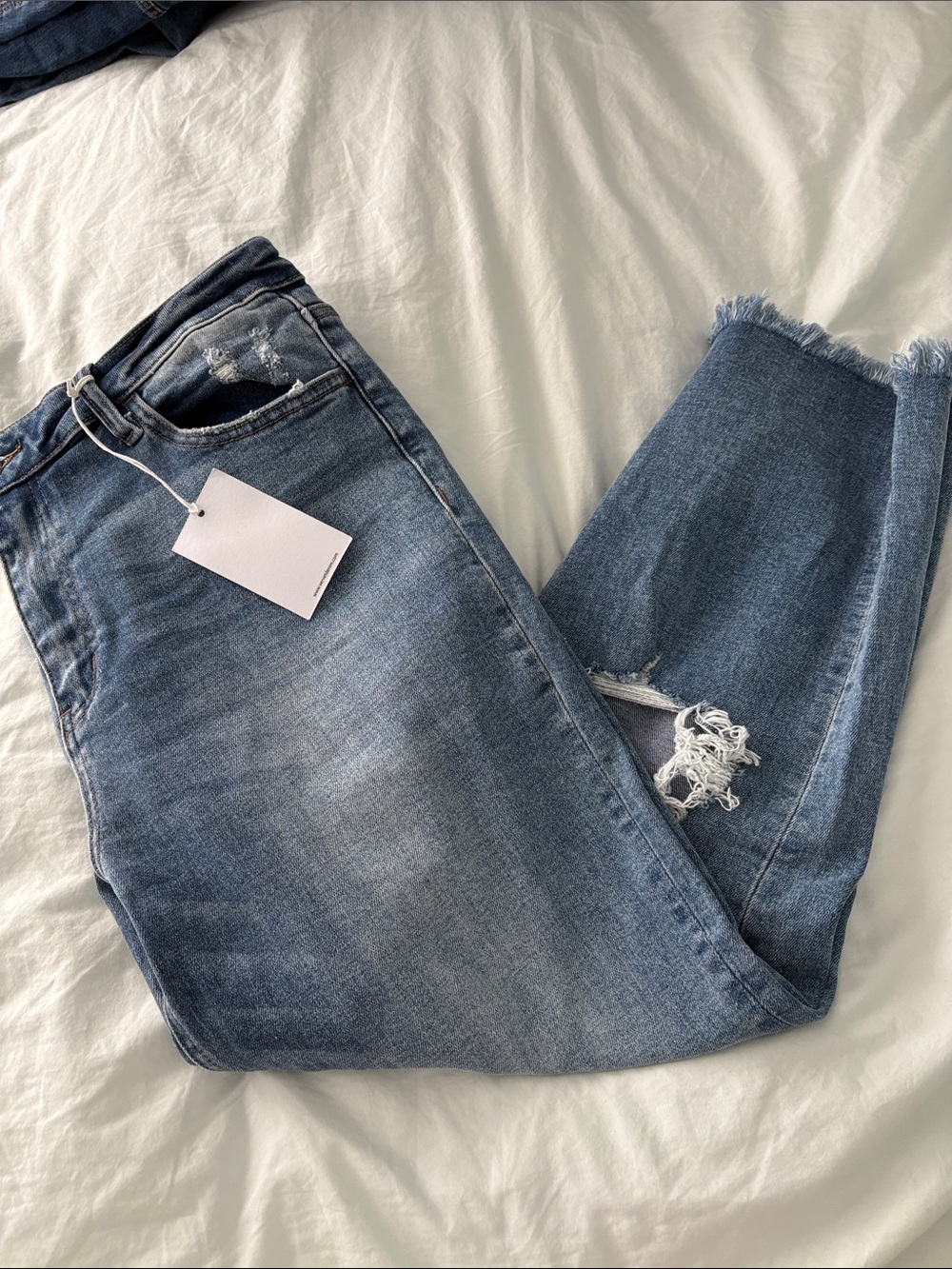Women's Light Blue Distressed Ankle Jeans